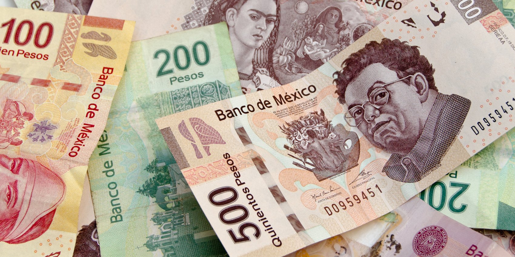 Mexican Pesos sprawled on a table