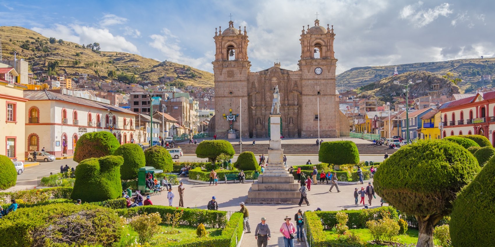 People walking around the Plaza De Aramas in Lima Peru.
