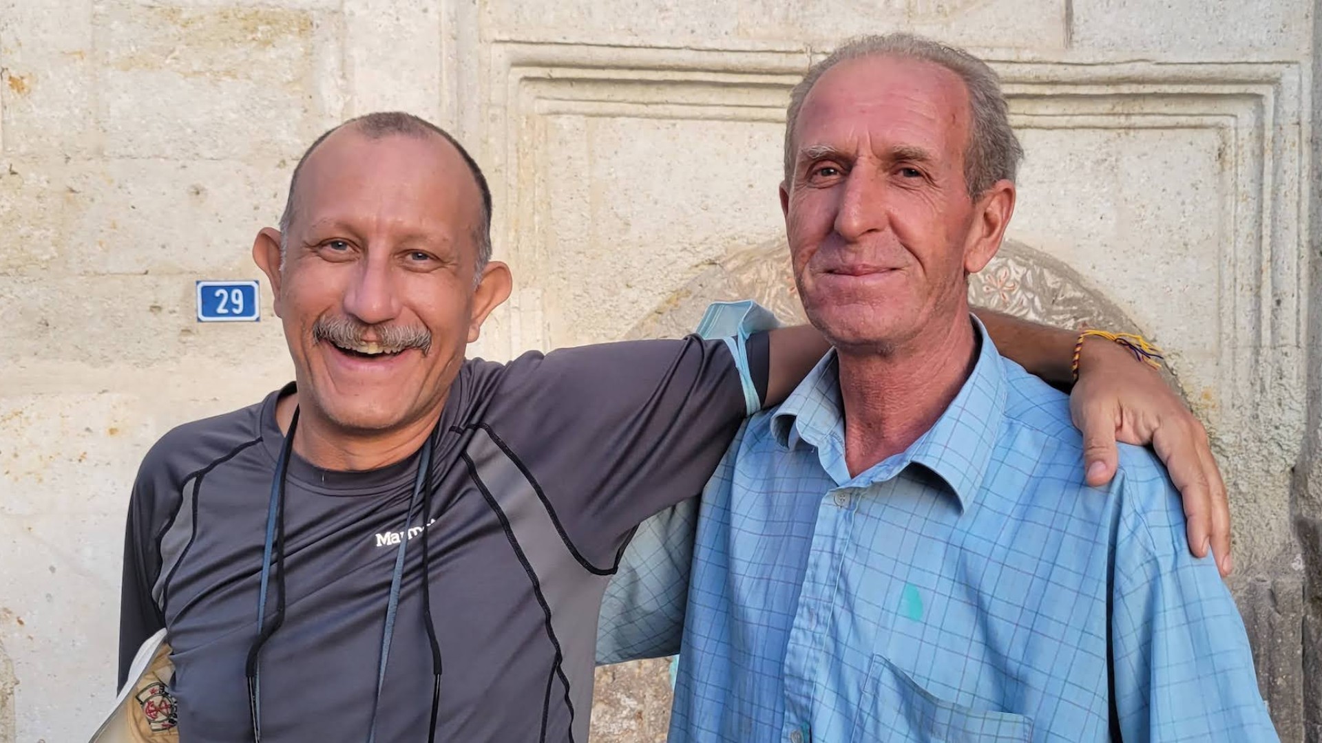 Tour guide and guests smiling while visiting Turkey