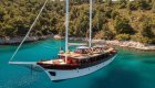 The Romantica yacht floating on calm blue waters in Croatia.