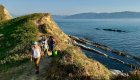 Group of hikers on a guided tour in Albania exploring the hillsides and coastline by hike.
