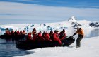 zodiac with people in antarctica