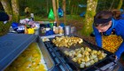 Kitchen set up cooking breakfast potatoes while camping on a small island in British Columbia