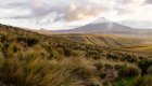 Panoramic view of a volcano standing tall and alone in Cotopaxi National Park