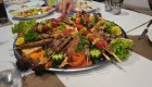 Kebabs ready to be served on a white platter in Turkey