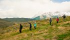 People hiking in Patagonia on an immersive guided eco-camp tour