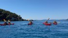 Sea kayakers paddling along the shores of Croatia