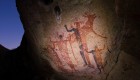 Night lit photo of ancient Indigenous cave paintings in the Baja interior