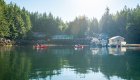 Sea kayakers paddling near God’s Pocket Resort in the sheltered waters of British Columbia