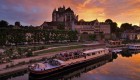 luxury barge in France at sunset