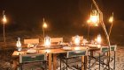 A table set up outside for an outdoor dinner. 