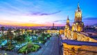 Arequipa’s Plaza de Armas with illuminated cathedral at sunset – Peru travel city highlight in South America
