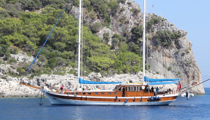 Side view of the Yaselam Yacht atop the Carian Coast in Turkey